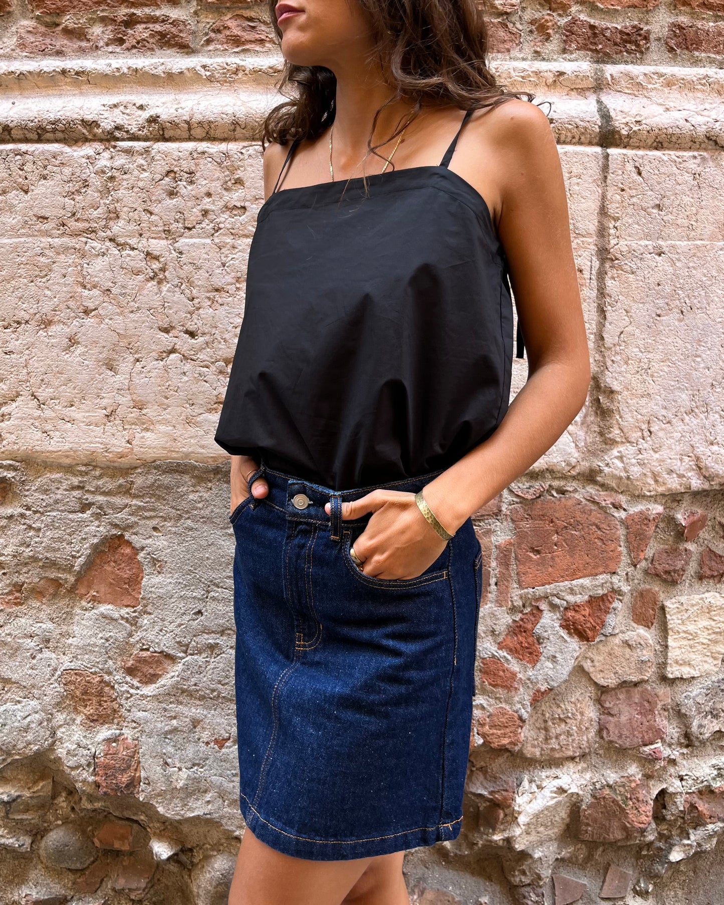 Top con maniche staccabili nero