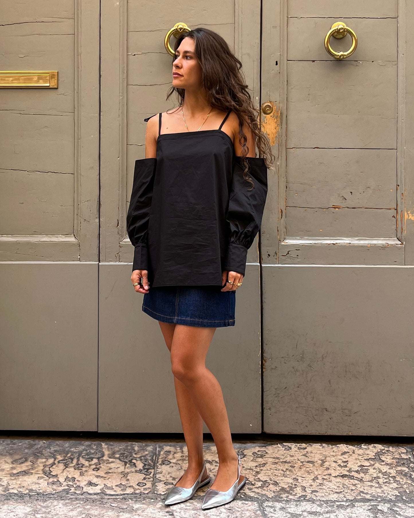 Top con maniche staccabili nero