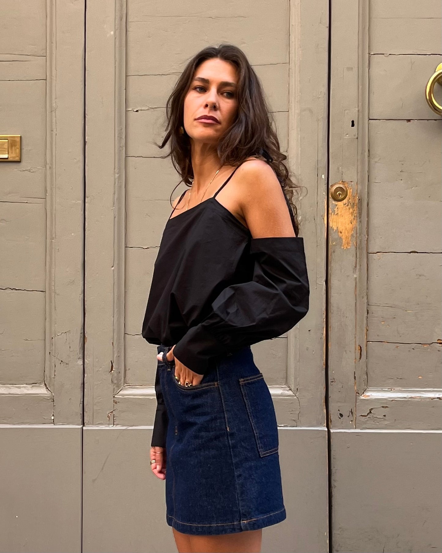Top con maniche staccabili nero